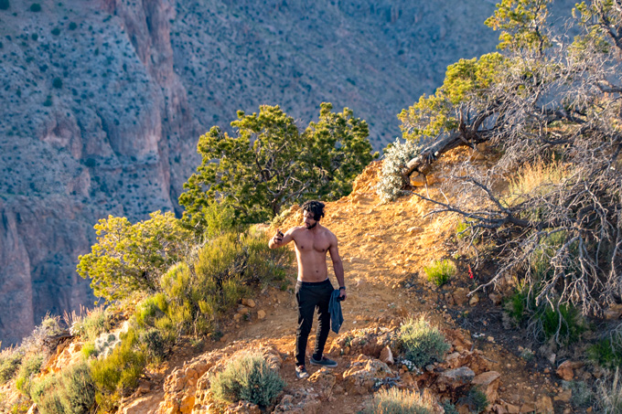 Shirtless man posing at the Watchtower Grand Canyon, Arizona