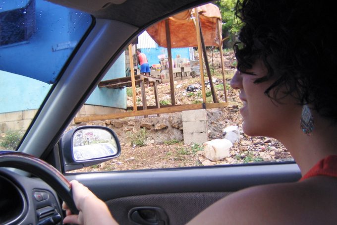 White woman driving in Jamaica