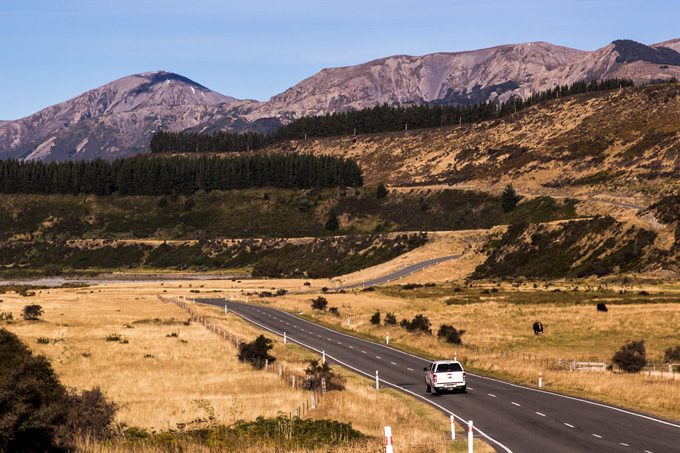 New Zealand roads, mountains, and car