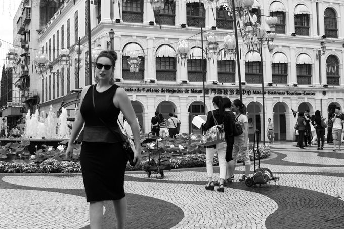 Jessica Peterson in Macao black and white cobblestone streets