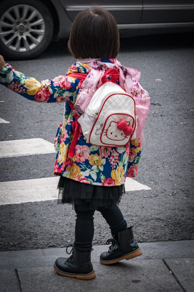 Little girl with Hello Kitty backpack in Shanghai, China