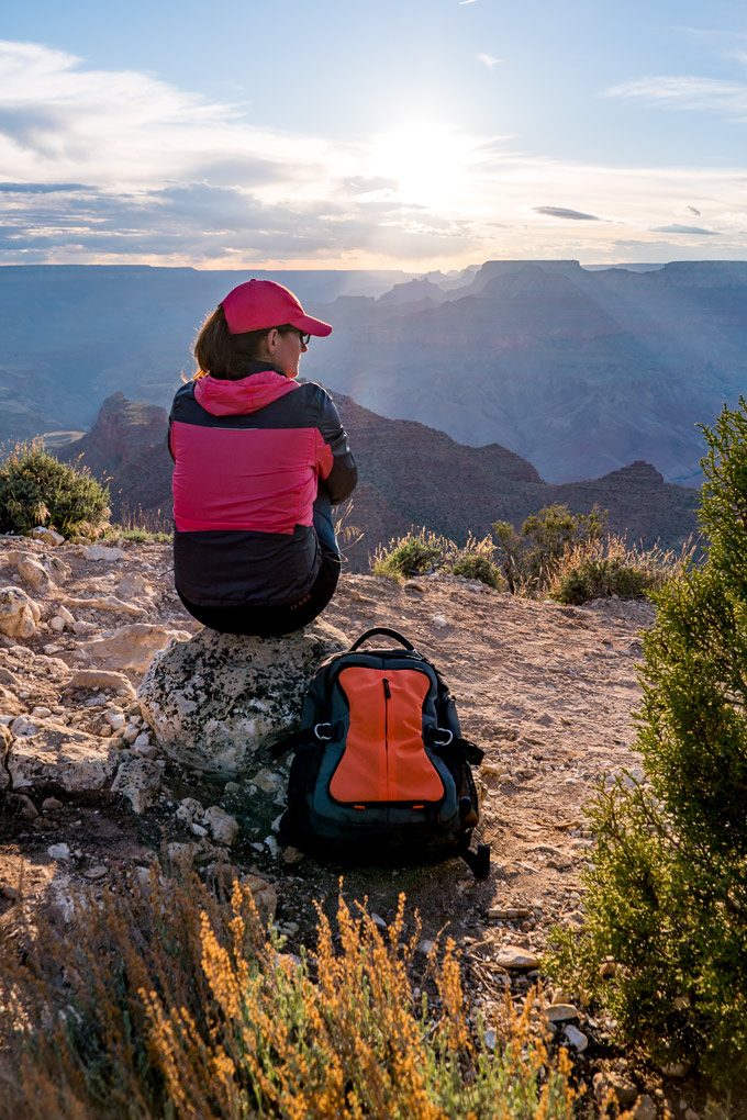 Hiker with backpack at Watchtower at Grand Canyon, Arizona