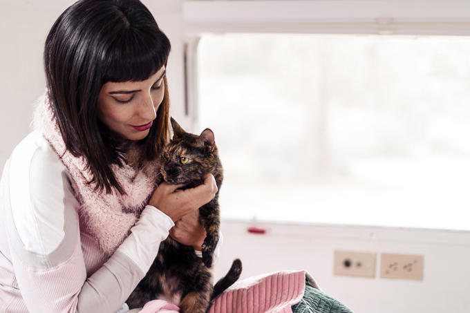 Global Girl Travels and her cat in an Airstream
