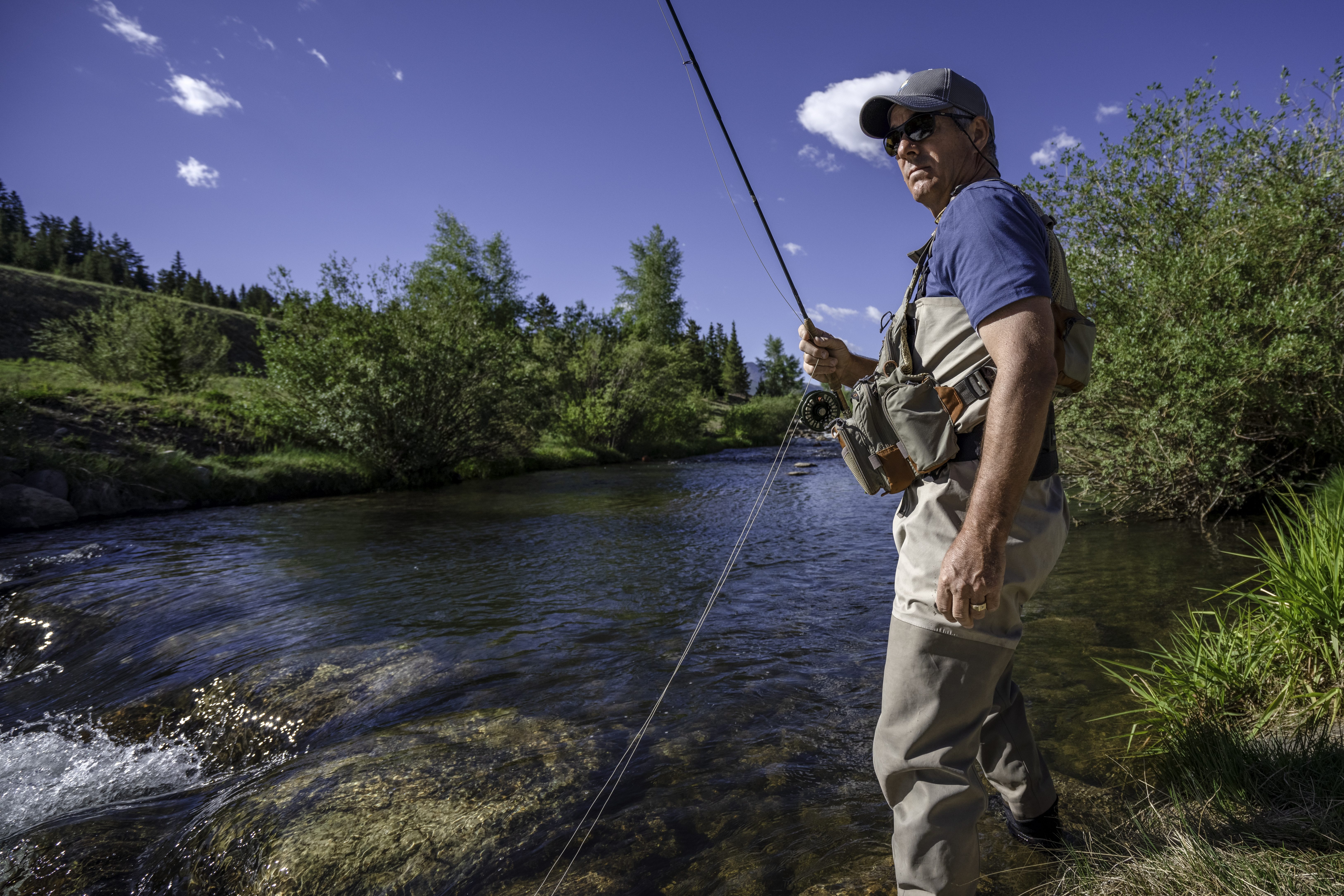 Man fishing in Breckenridge, Colorado